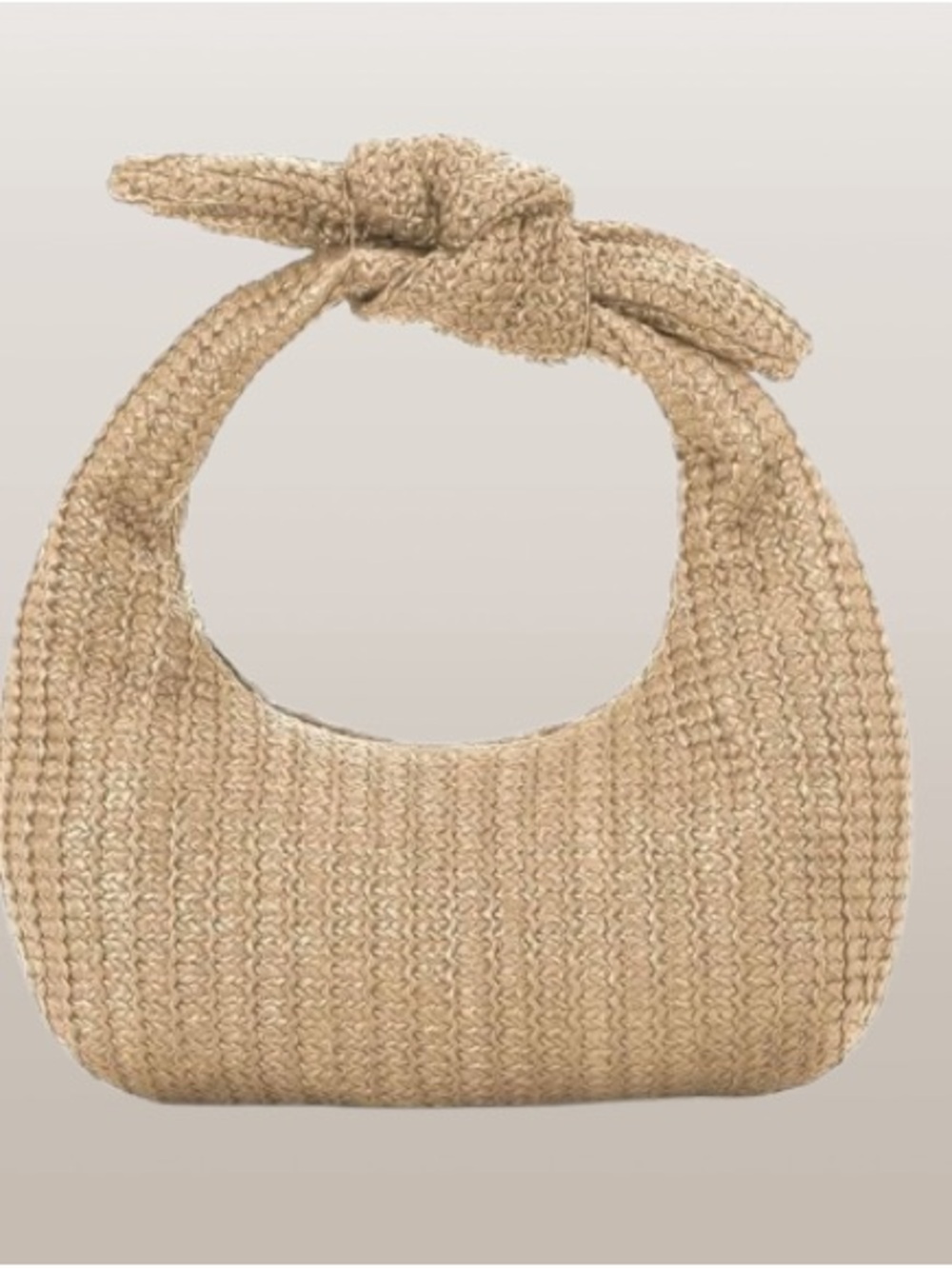 🆕- Knotted Woven Clutch Crescent shaped design and a top handle knot.